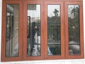 Mẫu cửa gỗ kính 4 cánh đẹp